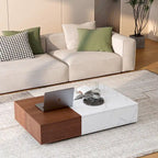 Table basse bicolore blanche et noire avec 2 étagères de rangement, utilisation par 1 personne